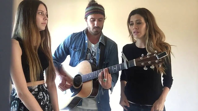 The Edgar Family Band singing together acoustically